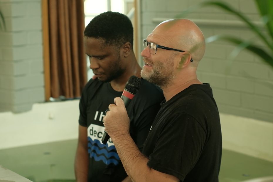 Mark Penrith baptising Mpho